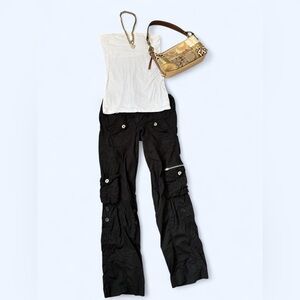Black cargo pants with zipper pockets, wide leg and low rise